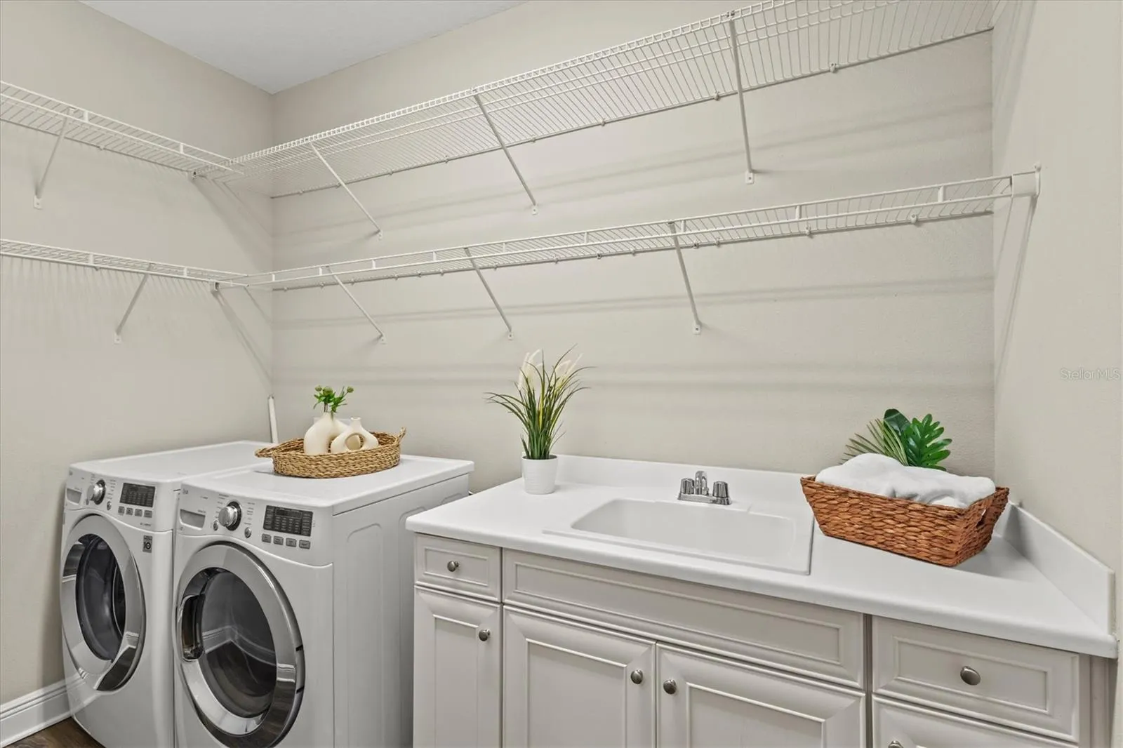 Laundry room with sink