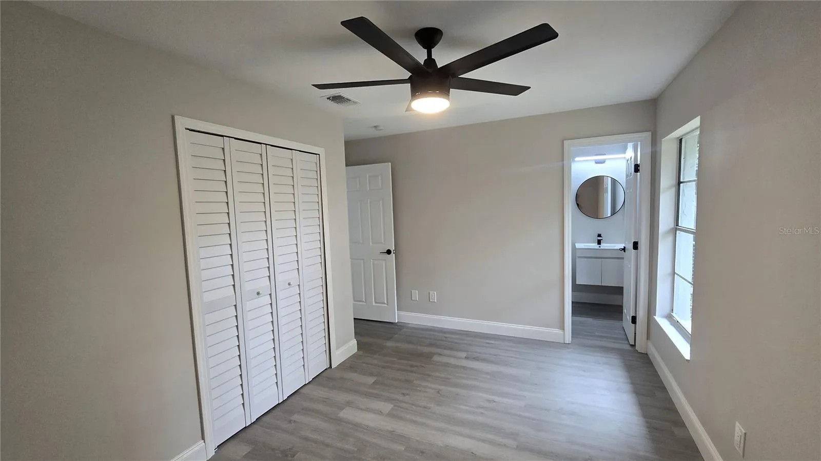 Bedroom 1 with half bath