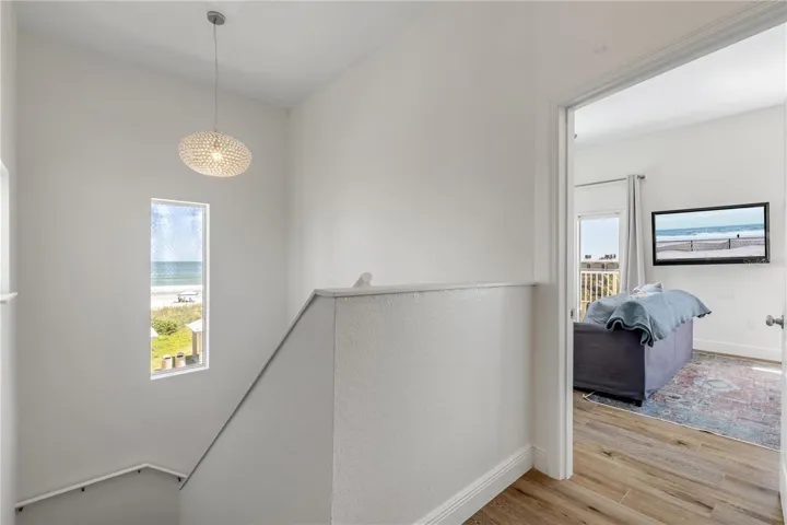 Stairs to Primary Bedroom and Bedroom 2