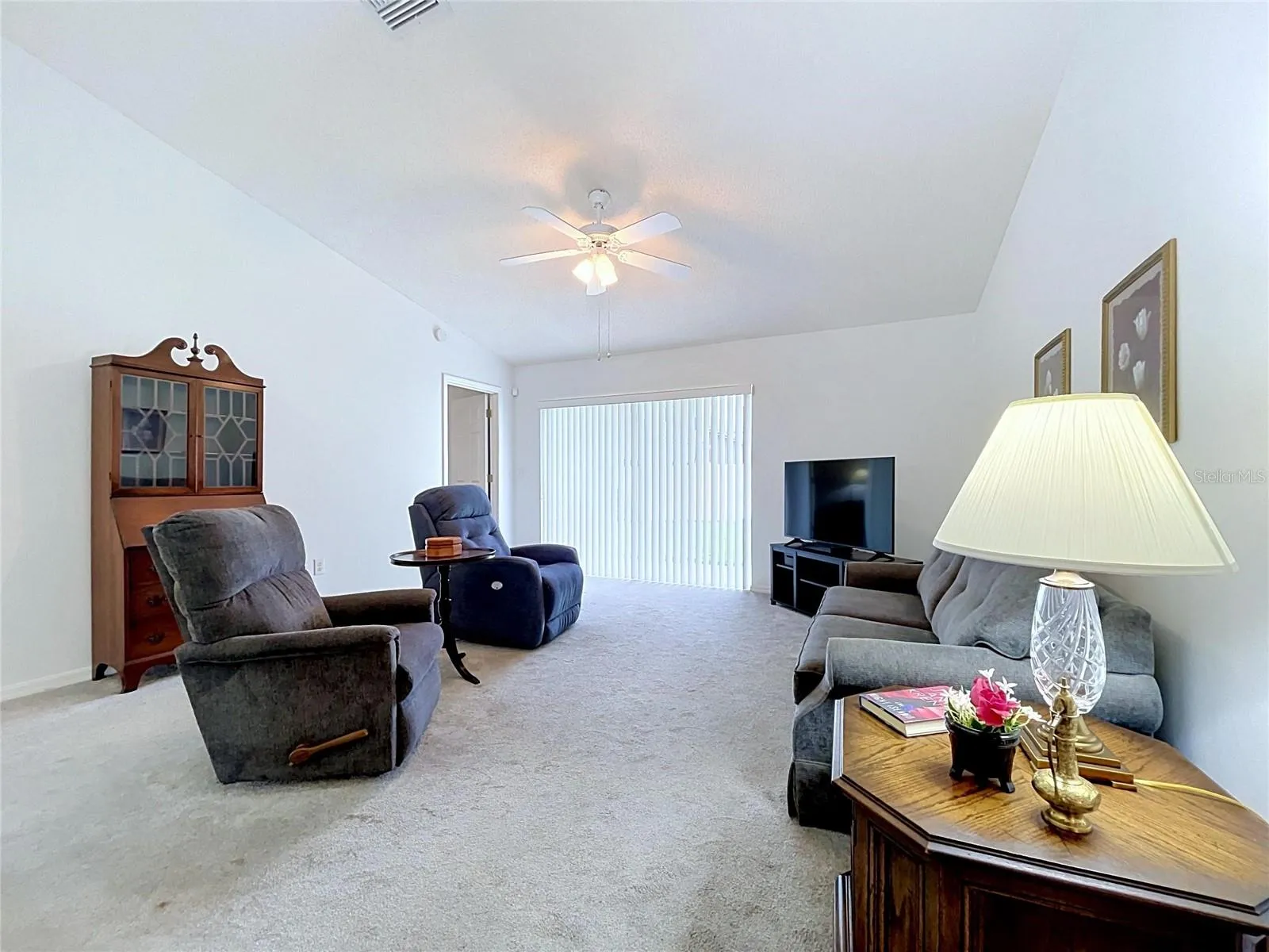 Open floor plan with sliding glass doors