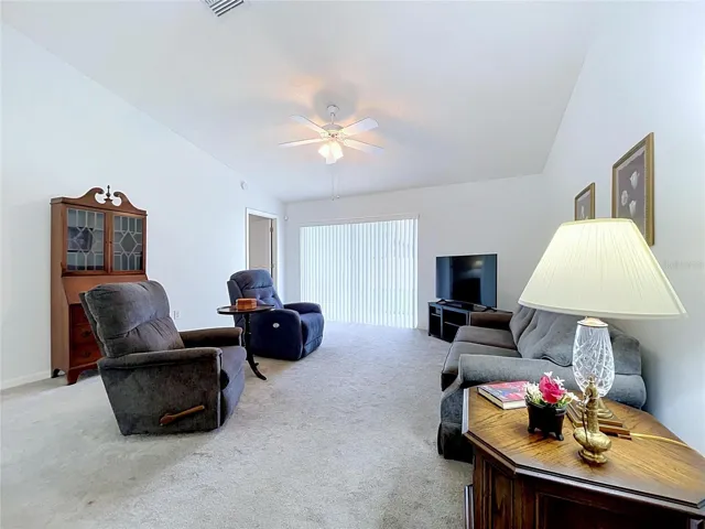 Open floor plan with sliding glass doors