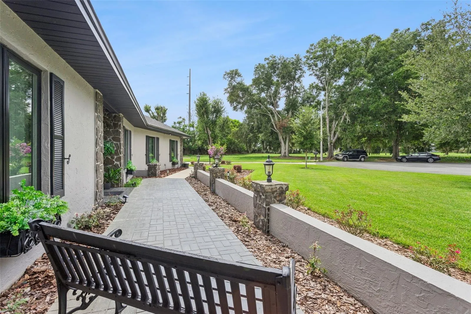 A grand courtyard welcomes you to sit and enjoy the beautifully landscaped grounds.