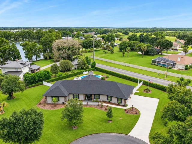 Located in the desirable, tree-lined community of Harbour Estates, this custom-built 3-bedroom, 2-bath pool home offers expansive living spaces