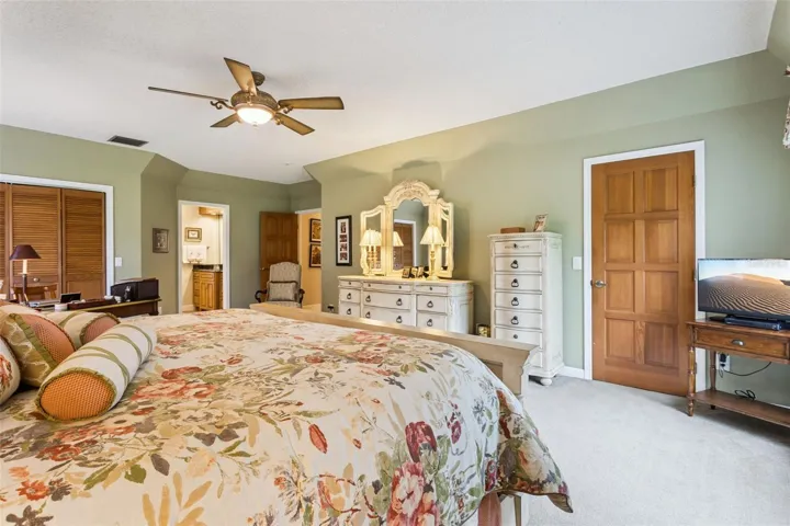 Primary Bedroom features a safe, and two closets, one of which is a walk-in closet