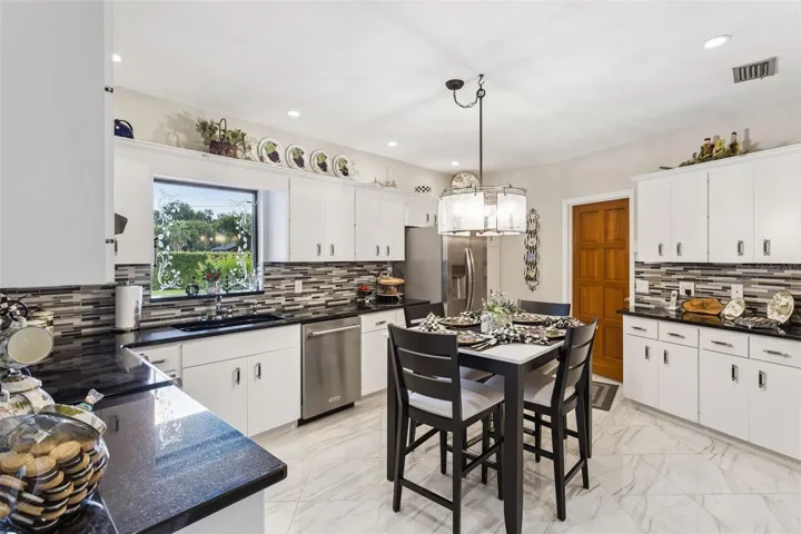 The charming breakfast nook and a convenient coffee bar with USB outlet add functionality