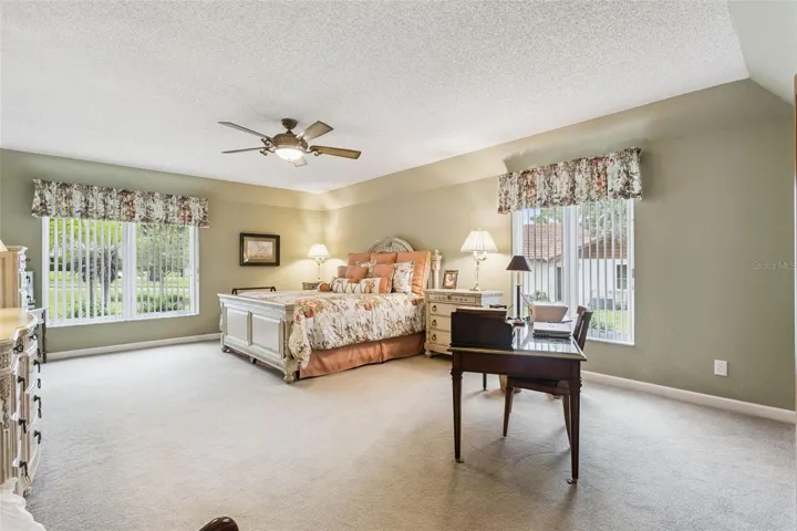 The spacious 16' x 23' Primary Bedroom Suite offers plenty of room for a comfortable sitting area