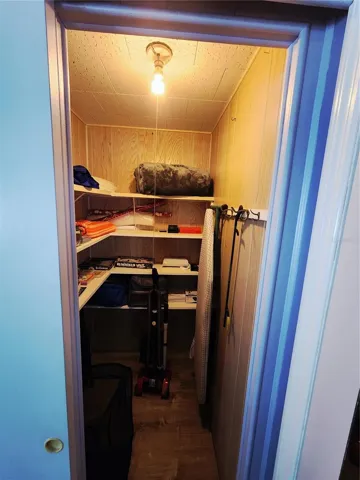 Primary Bedroom walk in closet