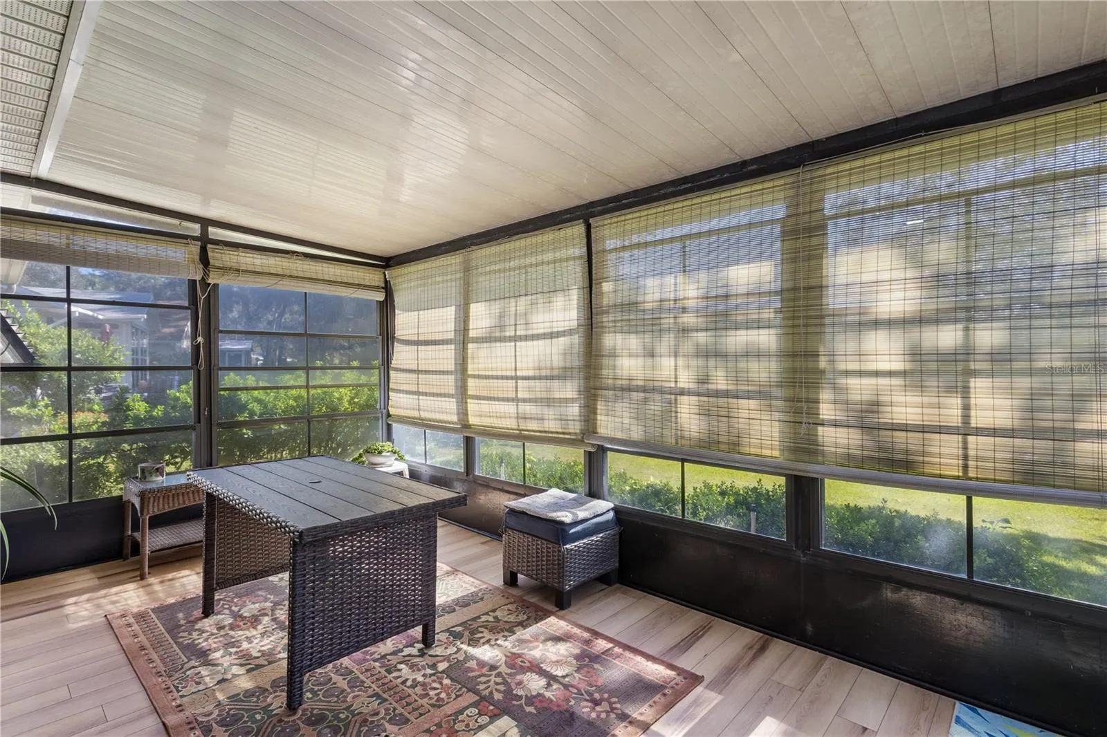 Florida Room with new flooring.  Steel pylons were added to shore up the room.