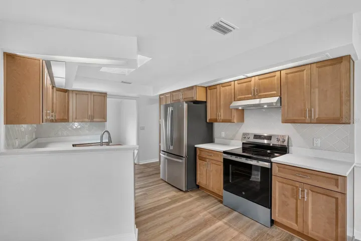 newly renovated kitchen with quartz counters