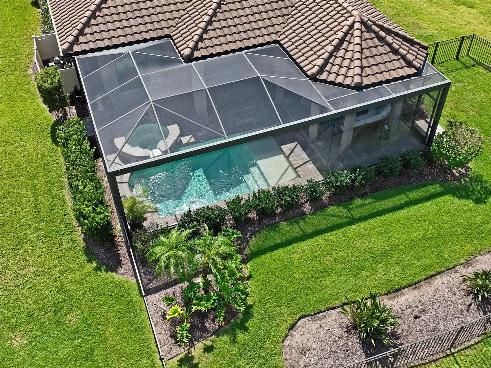 Drone view of backyard, Saltwater Pool &amp; Spa w/ screen enclosure