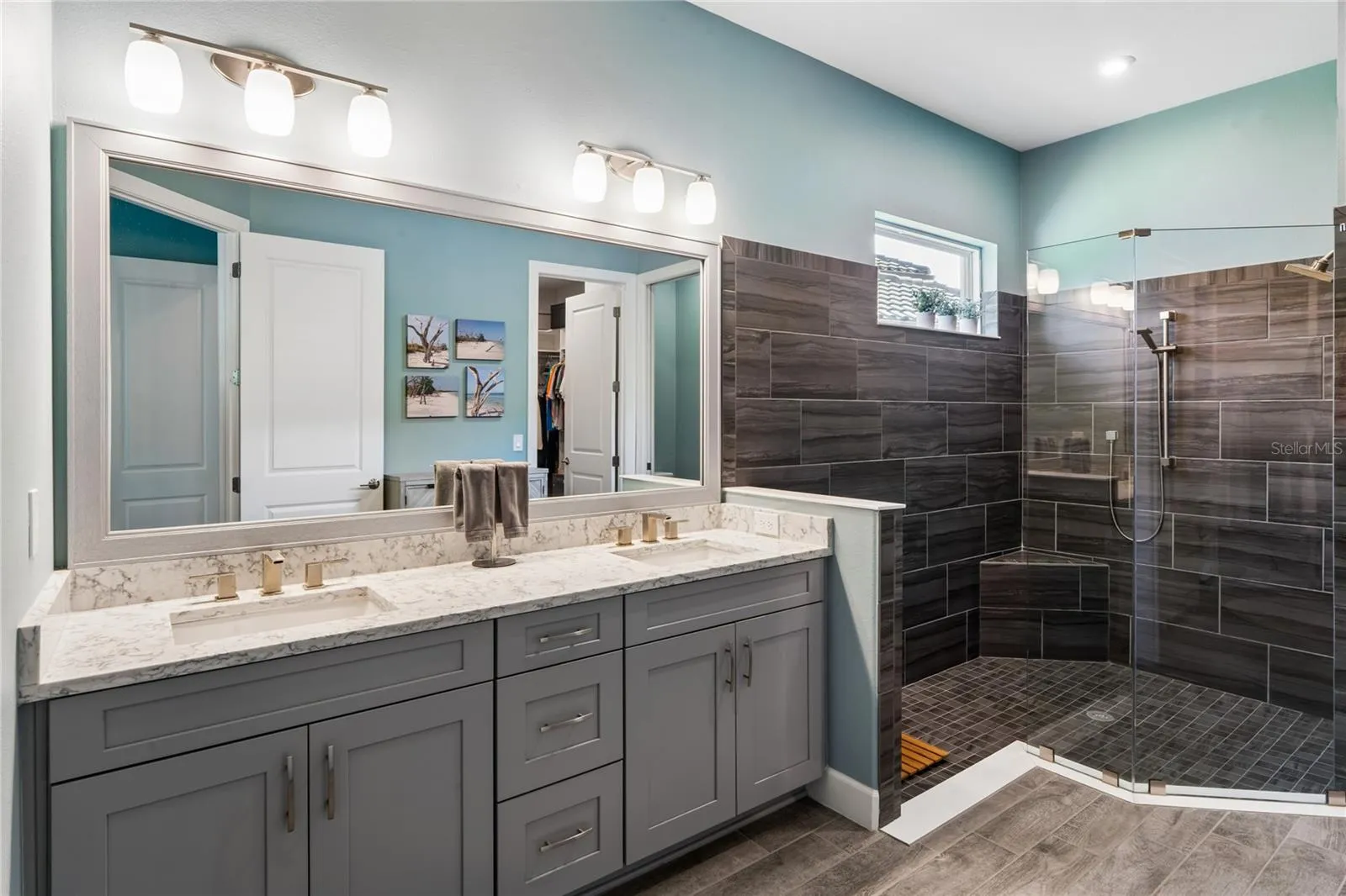 Primary Bath walk-in shower with Dual shower heads and double vanity sinks