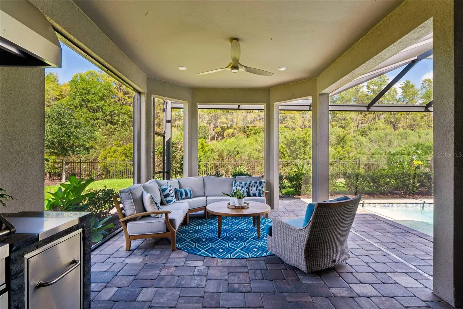 Outdoor covered living space w/ Teak furniture
