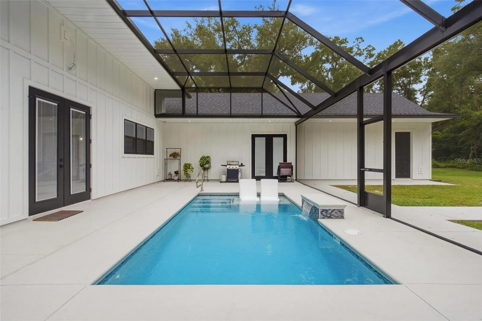 View of back porch and pool