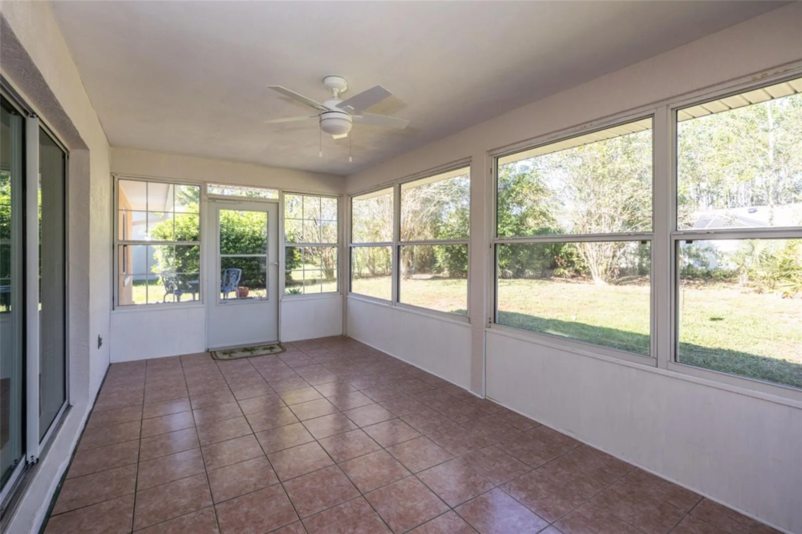 Florida room with tile flooring