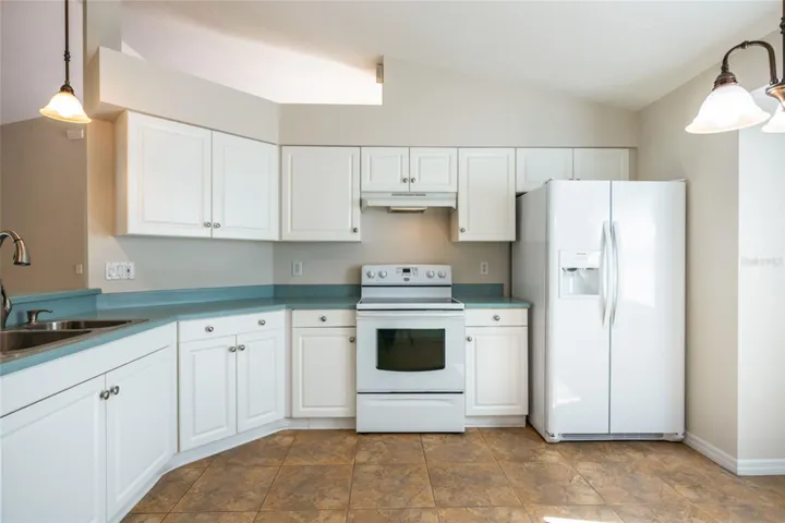 All white cabinets and appliances