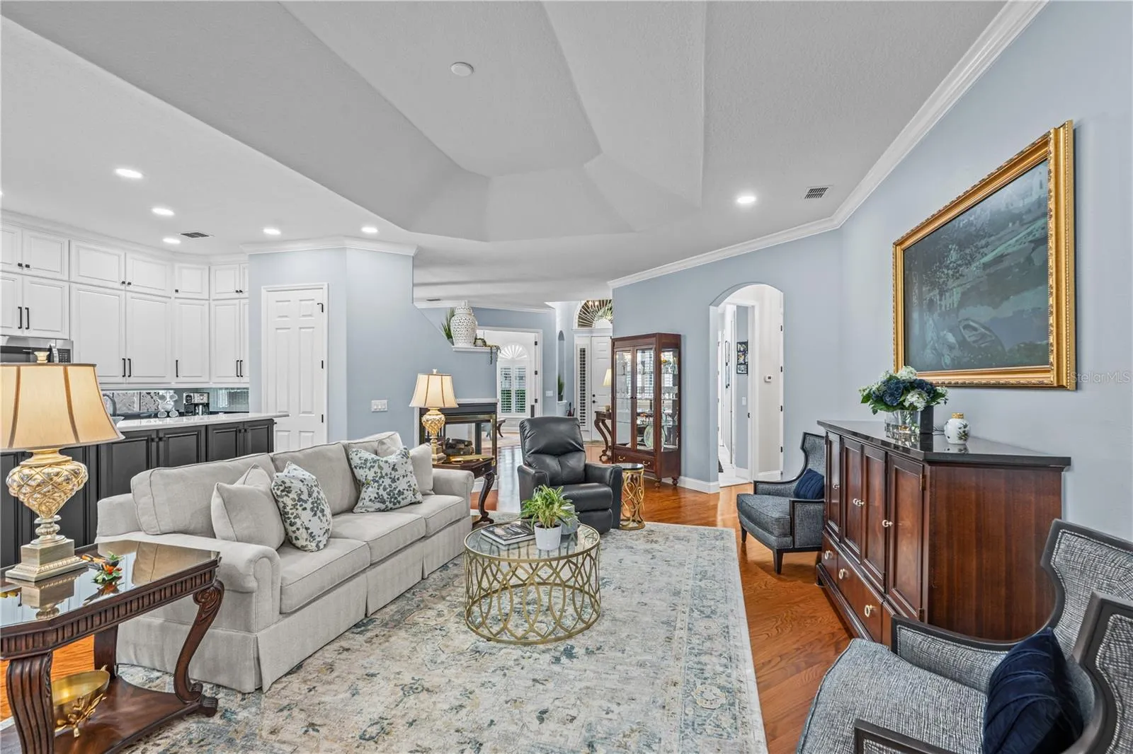 The tray ceiling adds to the spacious feel of room