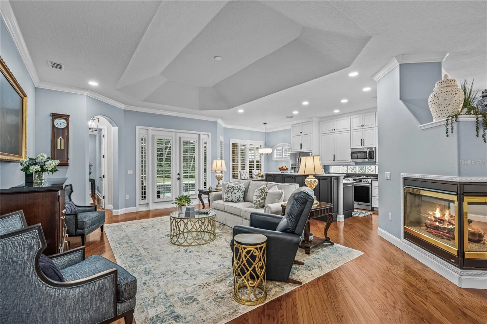 Great room which is open to the kitchen with French doors out to the lanai