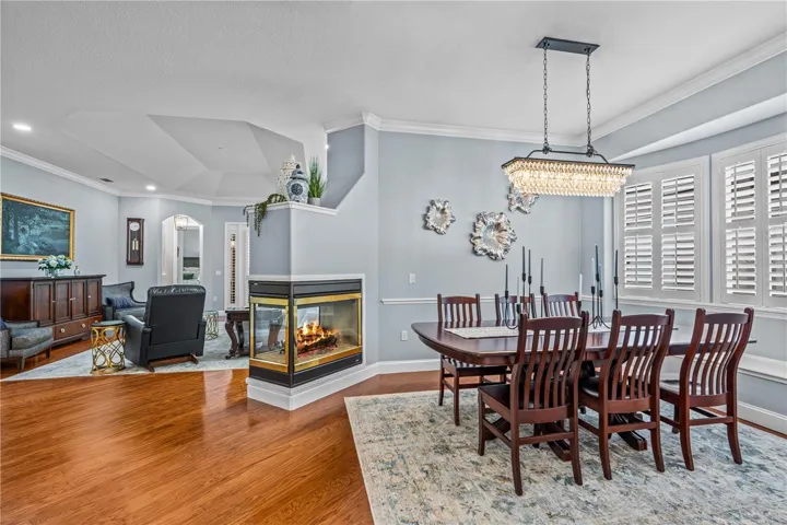 Open concept living makes entertaining easy-- Dining room flows to Great Room and Kitchen