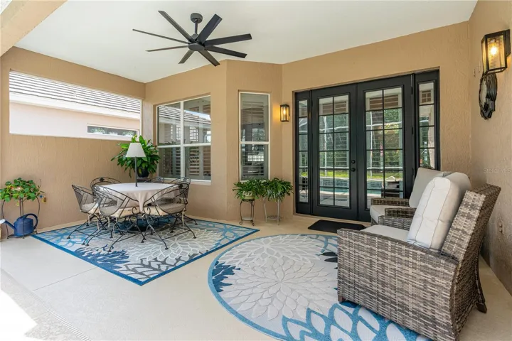 The relaxing back porch/lanai; French doors lead into the Great Room