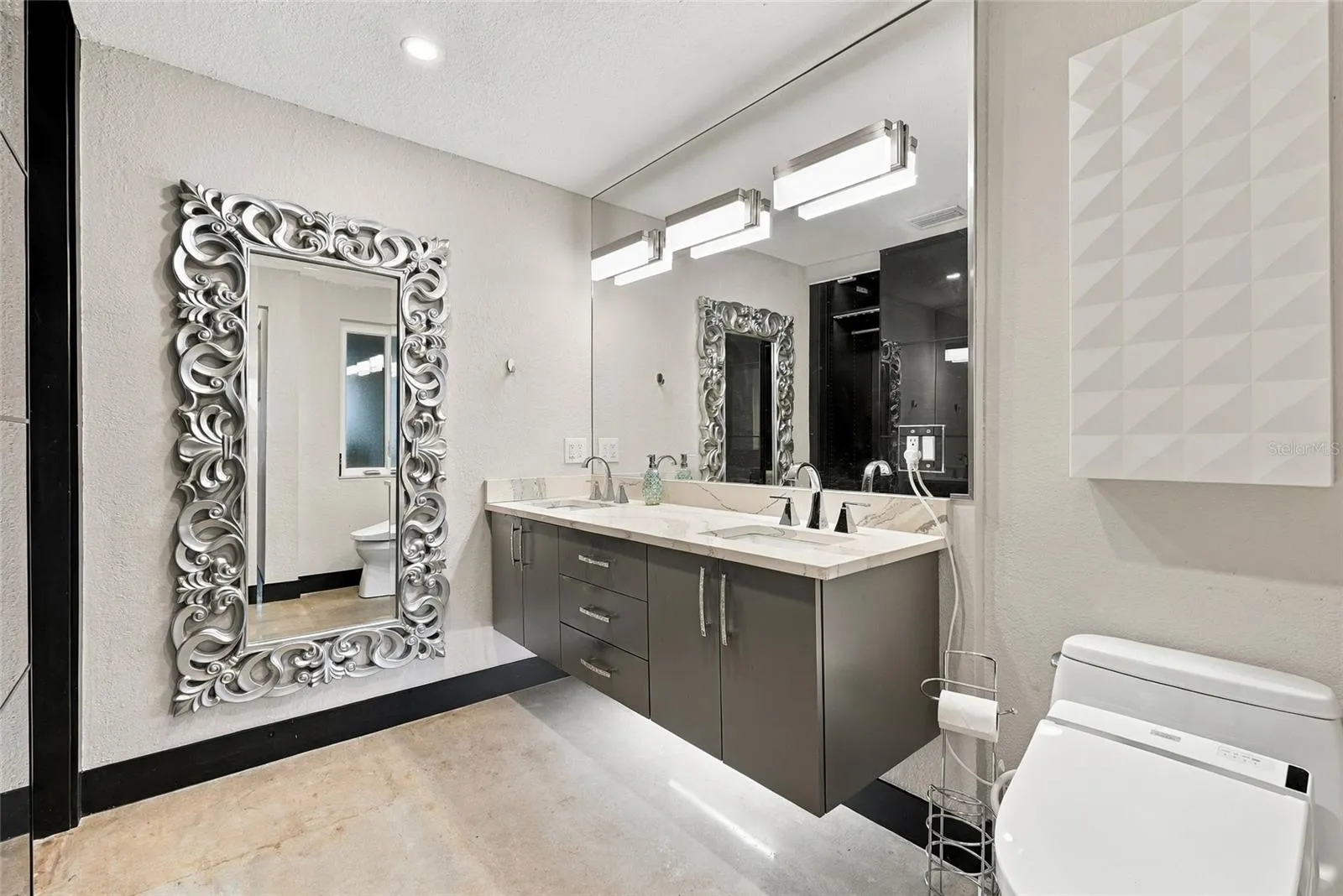 dual sink ensuite with built-in closet system