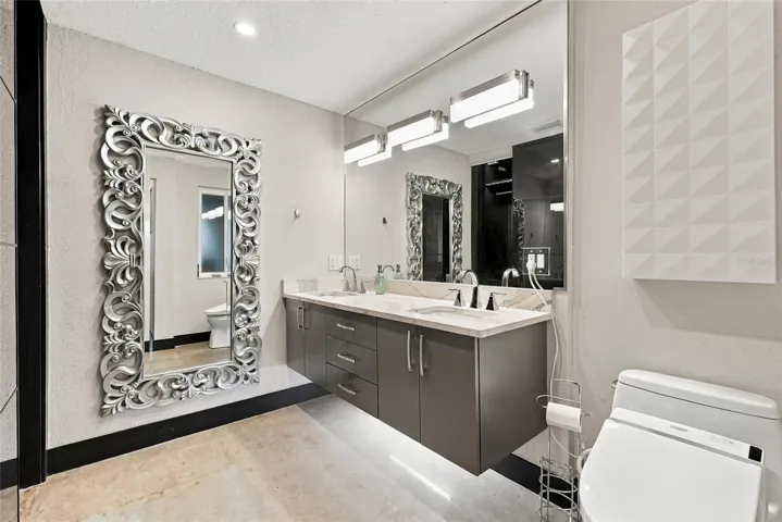 dual sink ensuite with built-in closet system