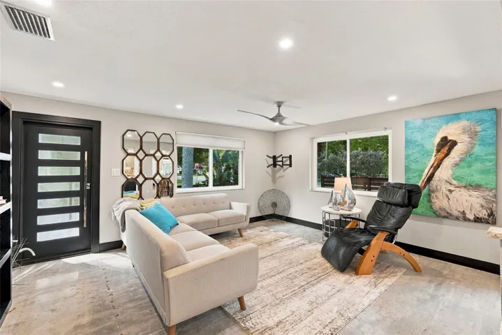 living area with impact windows