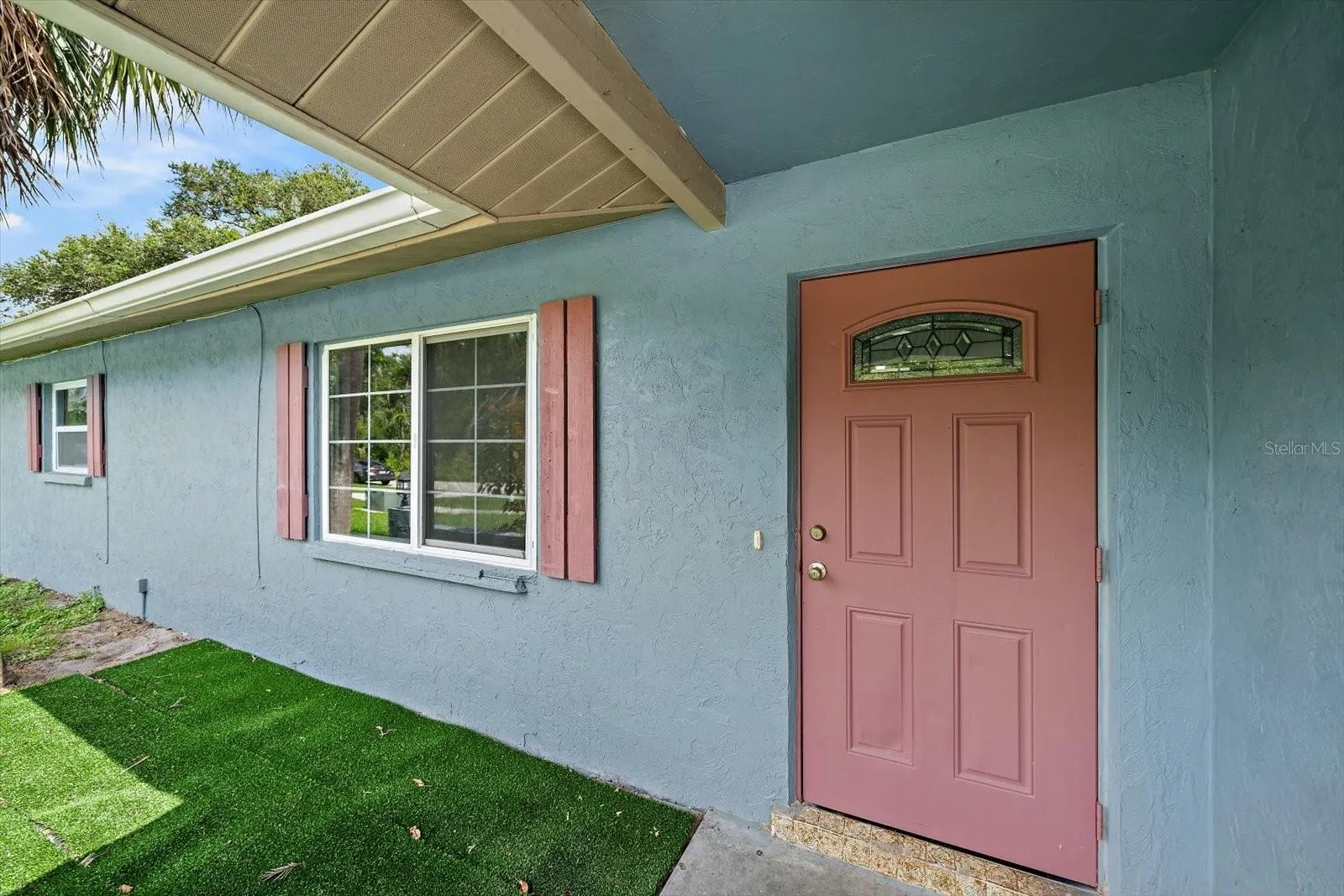 Bring your creativity to this front porch.