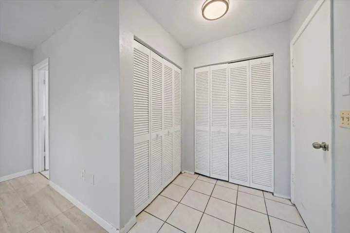 (2) Closet tiled Foyer (from main living area) leading into the Primary suite.