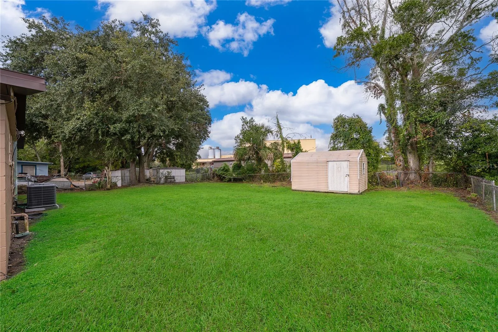 Huge Back Yard with Storage Building