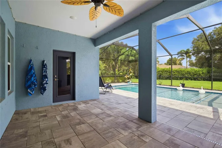 Covered lanai overlooking the pool