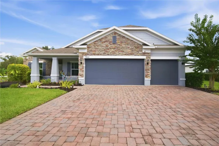 Daytime front exterior with inviting curb appeal.