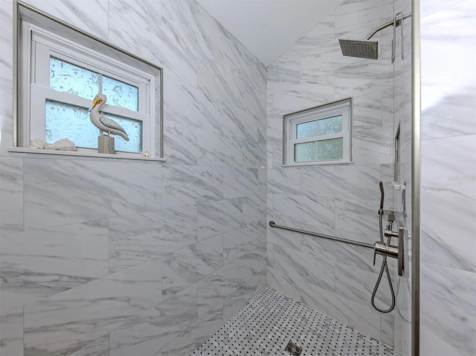 You will LOVE this beautifully updated shower!