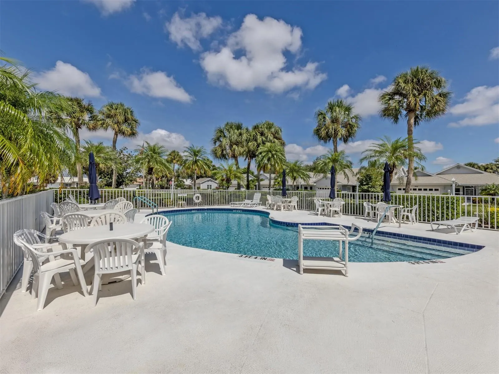 The Colony Place pool is large and offers plenty of seating for everyone