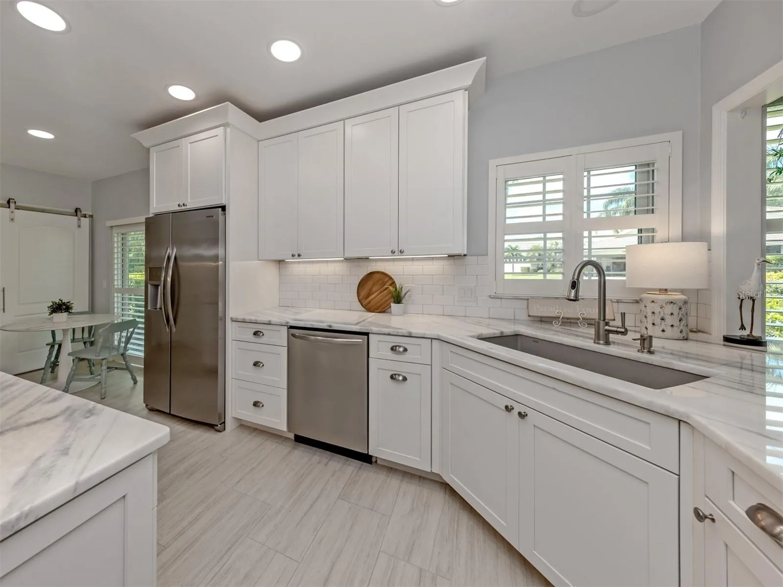Quartz countertops, soft close drawers &amp; doors and, under counter lighting solid wood cabinetry  make this the perfect kitchen