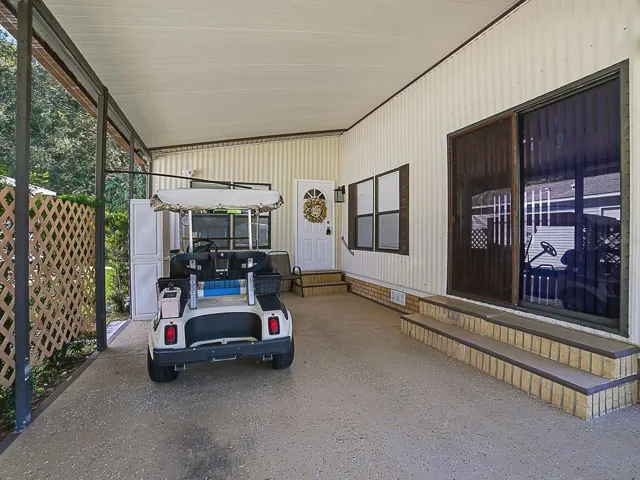 Carport includes golfcart