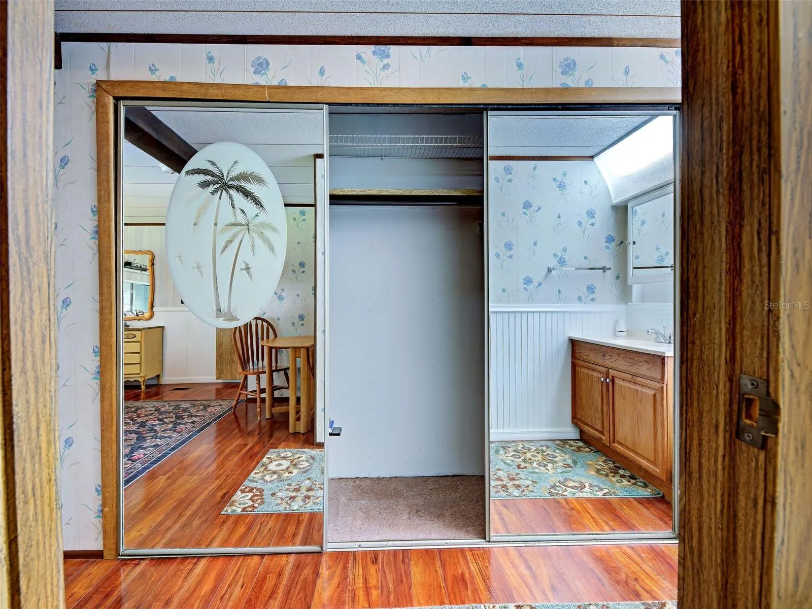 Large mirrored closet in Primary Bedroom
