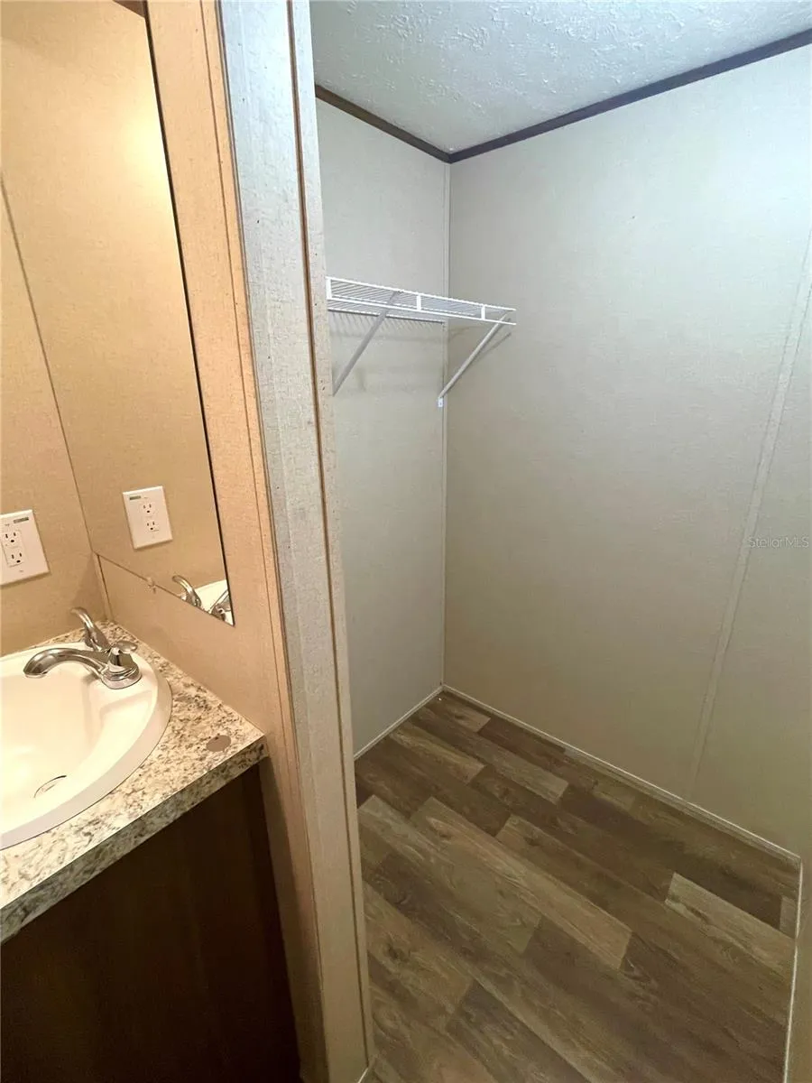 Master Bedroom closet in master bath