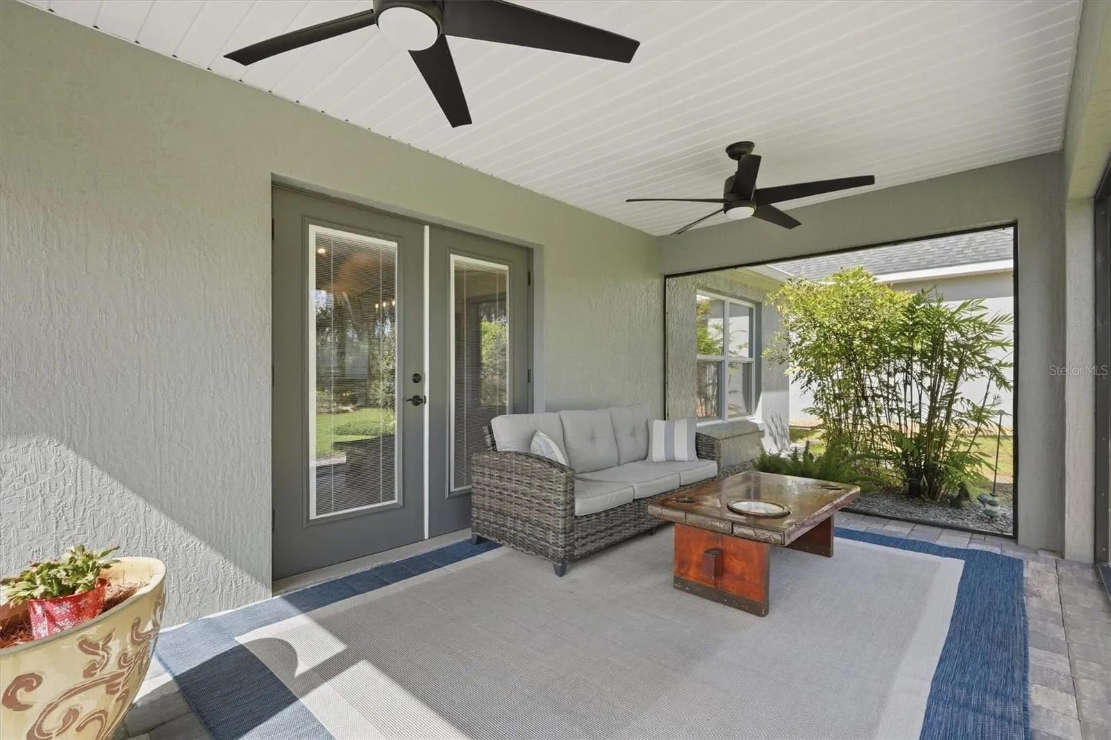LARGE PATIO WITH SCREENS FLOOR TO CEILING