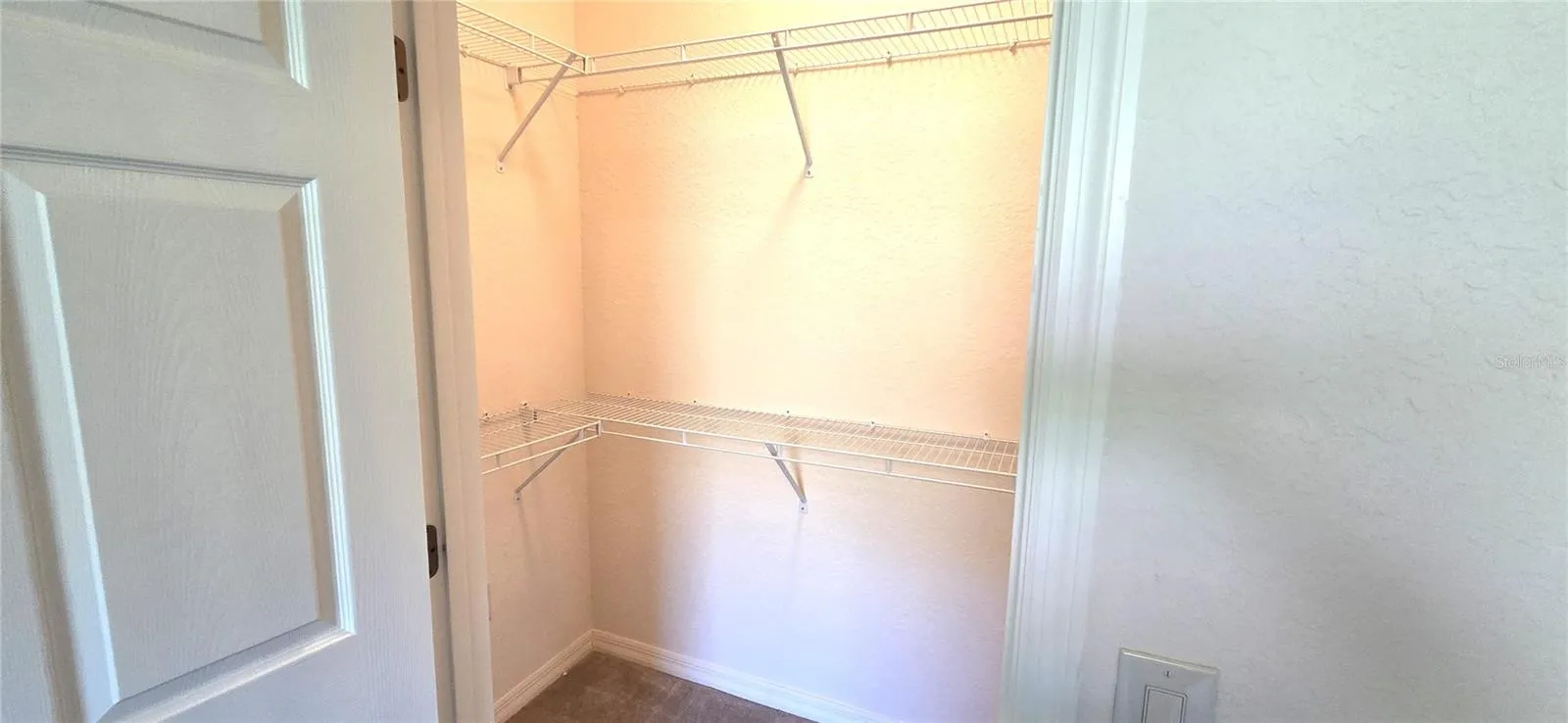 Primary Bedroom Walk-In Closet