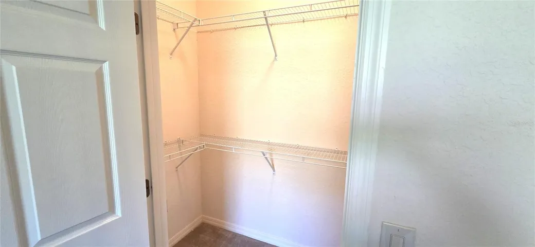 Primary Bedroom Walk-In Closet