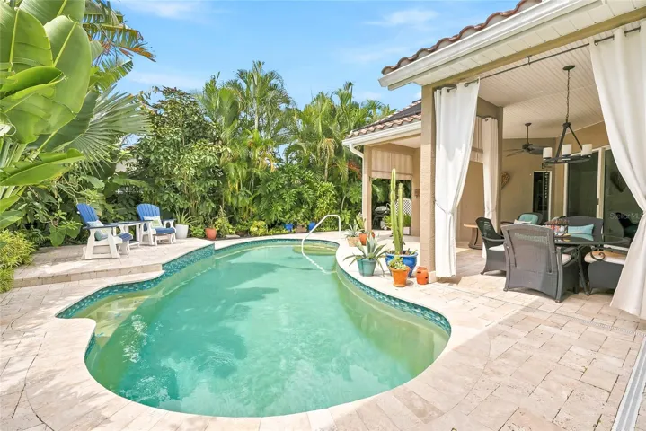 Solar-heated pool perfect for swimming laps or cooling off on the bench seat.