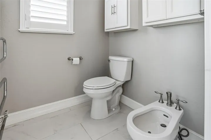 Separate commode, bidet and towel warmer for your shower experience.