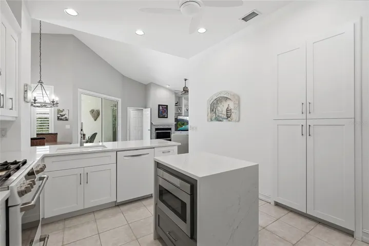 Breakfast bar with the dinette beyond creates a perfect space to congregate.