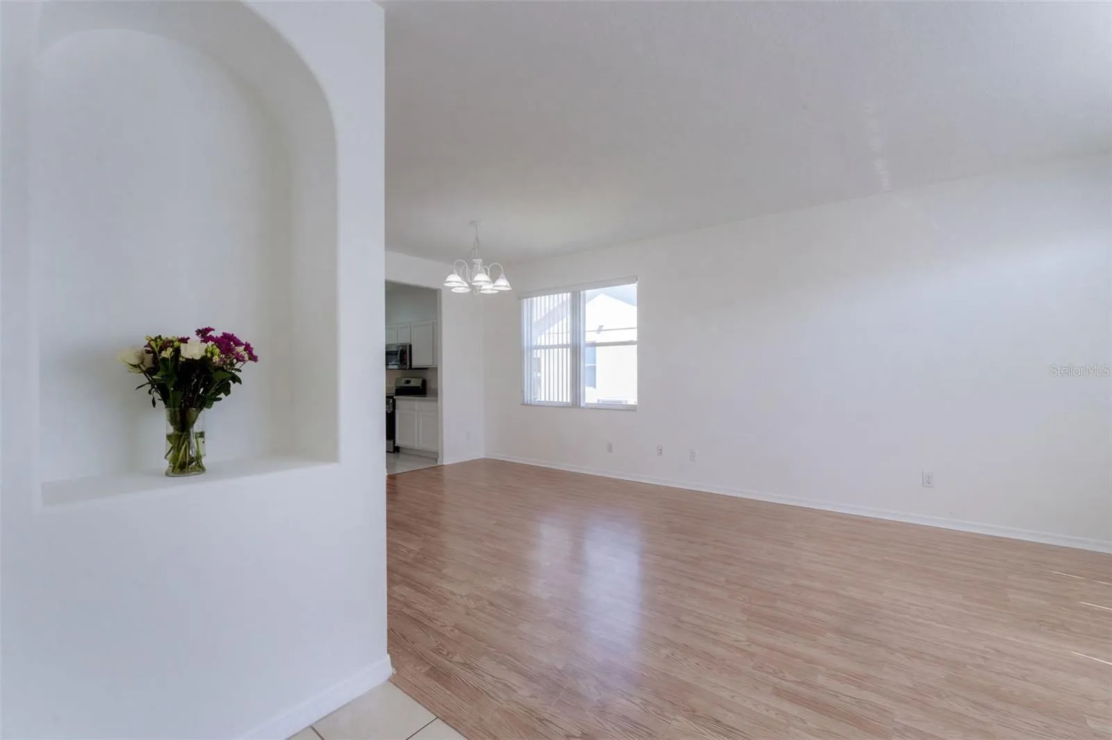 From front door, looking into living room/dining room