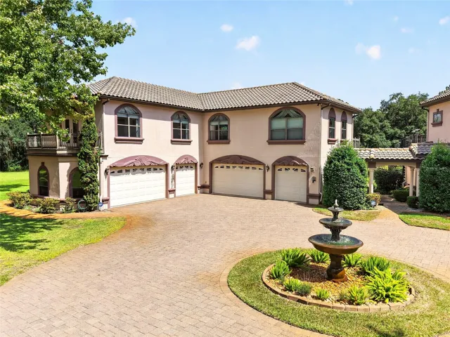 Six car garage with two bedroom apartment known as "The Cuckoo's Nest"