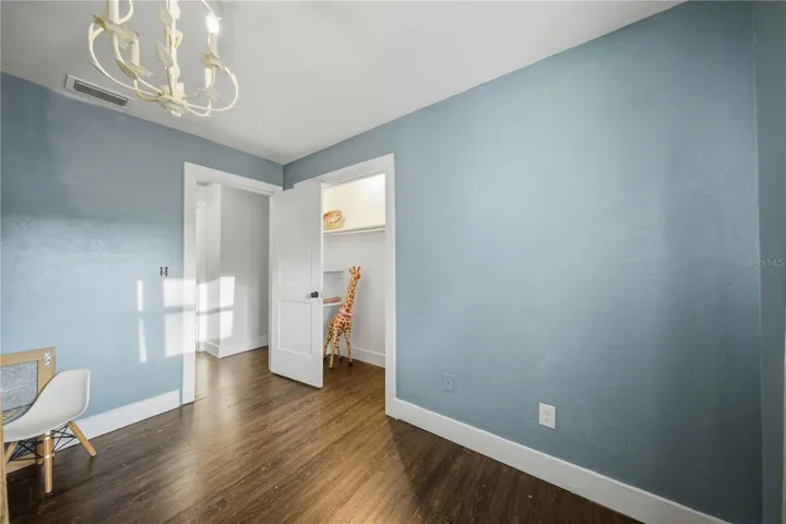 Third bedroom with loft bed (light fixture does not convey and will be replaced with original)