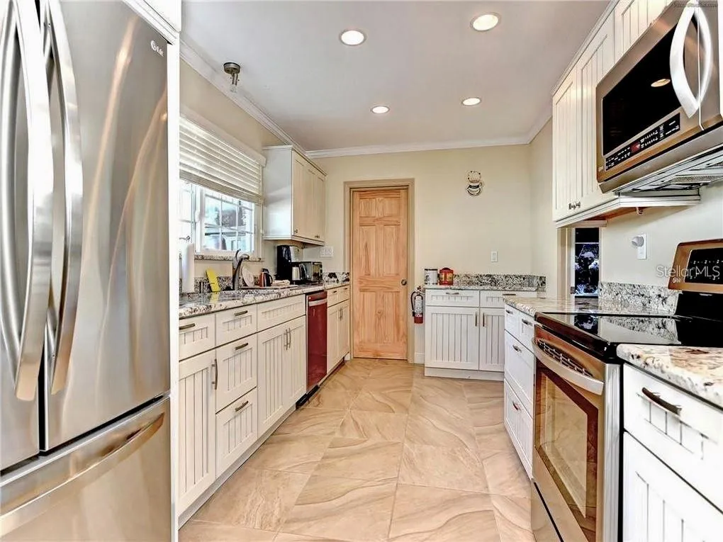 Conveniently equipped community kitchen for gatherings and events.