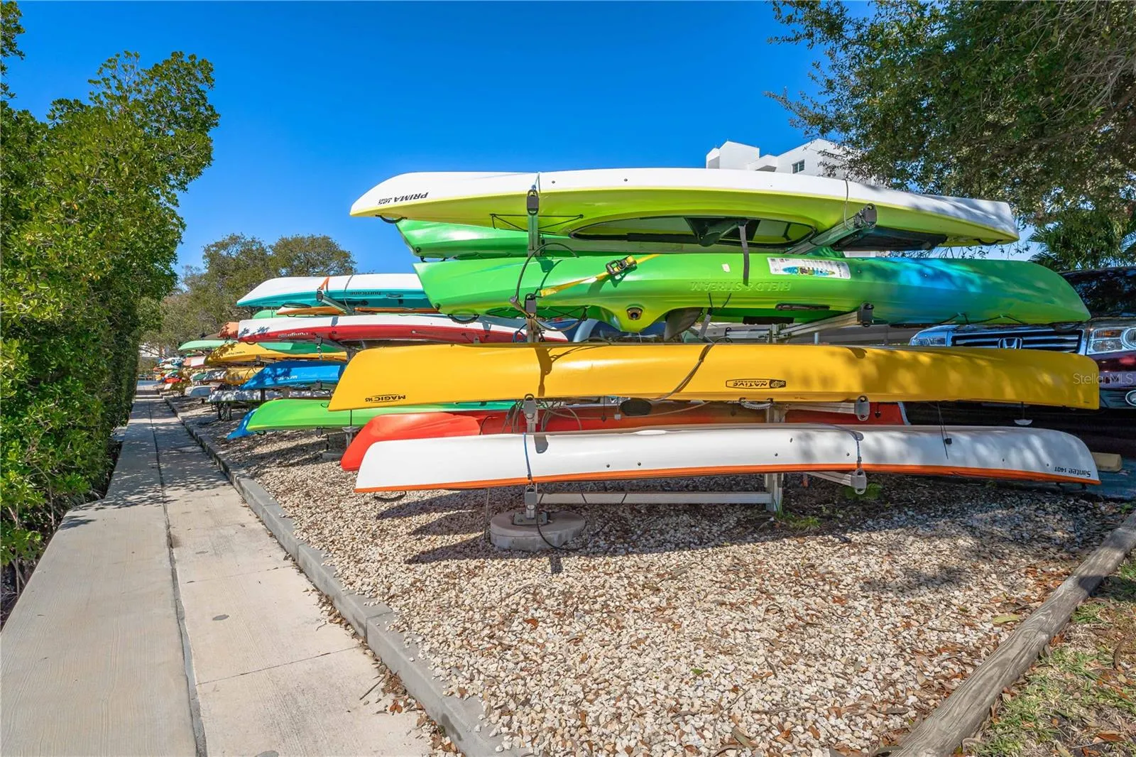 Generous kayak, SUP, and canoe storage and easy access to surrounding waters..