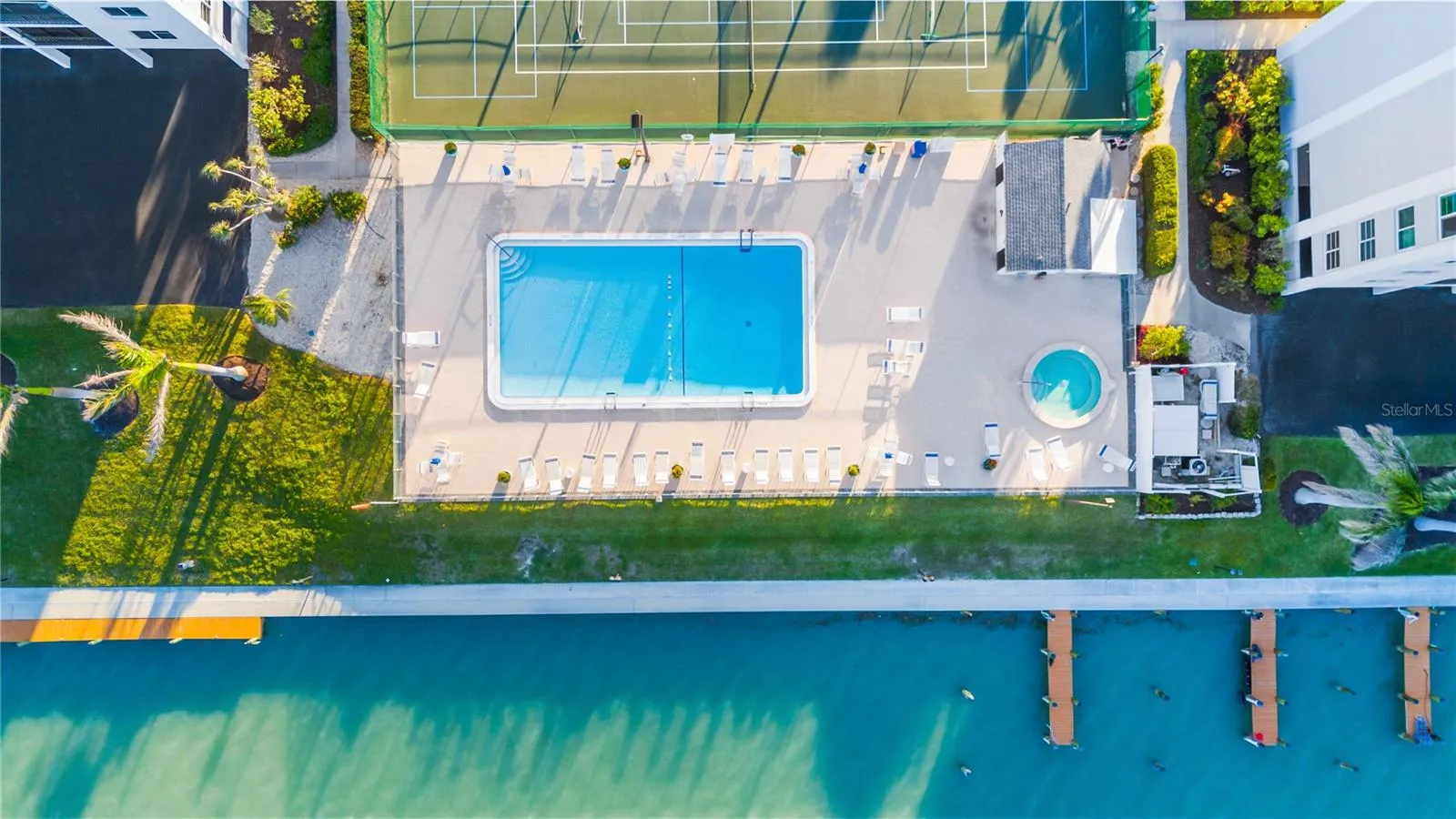 Heated pool &amp; spa overlooks the crystal clear waters