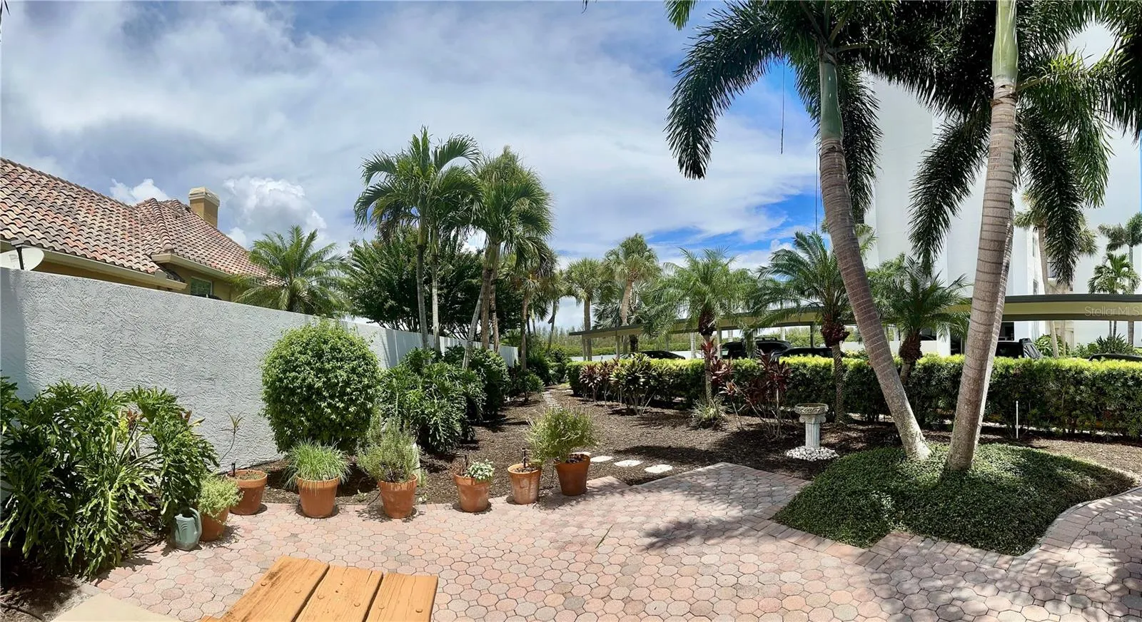 ropical landscaping creates a peaceful island setting.